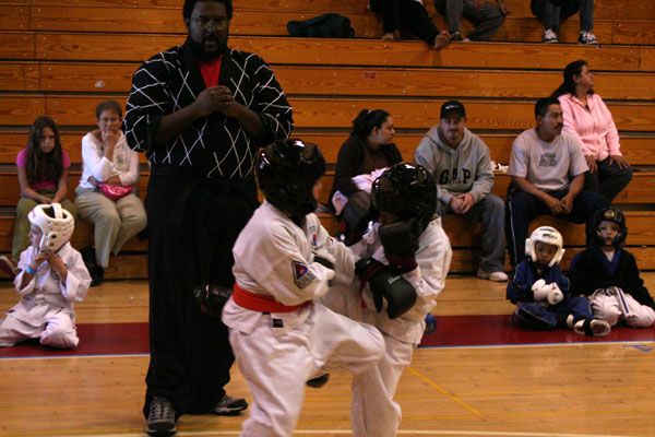 Inst. McCalla controls the junior sparring action